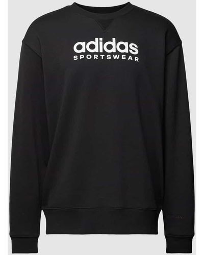 adidas Sweatshirt mit Label-Print - Schwarz