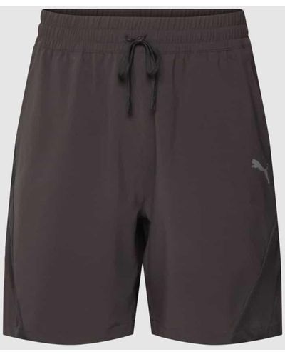 PUMA Shorts mit Label-Print Modell 'Woven' - Grau