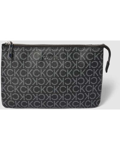 Calvin Klein Handtasche mit Label-Applikation Modell 'CK MUST' - Grau