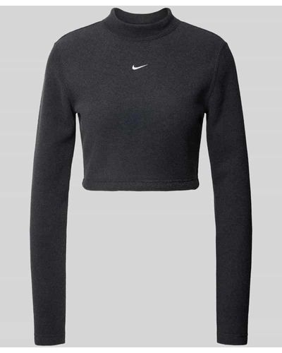 Nike Cropped Longsleeve mit Logo-Stitching - Blau