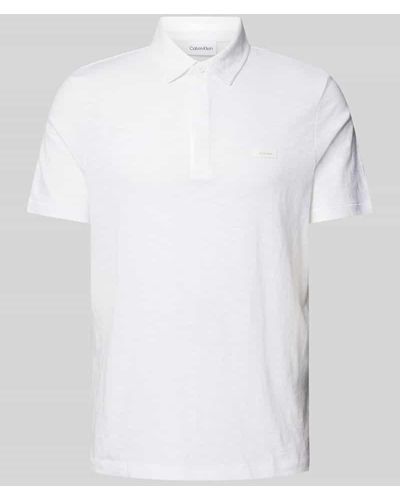 Calvin Klein Regular Fit Poloshirt mit Knopfleiste - Weiß