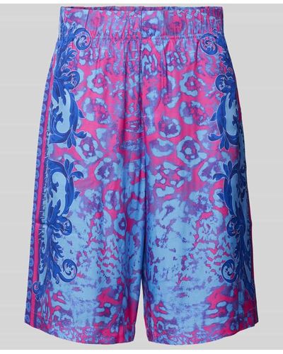 Versace Sweatshorts aus Viskose mit Allover-Muster - Blau