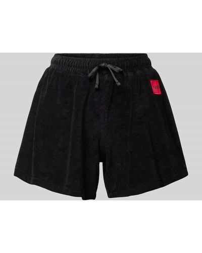 HUGO Loose Fit Shorts mit Label-Patch Modell 'BONNIE' - Schwarz