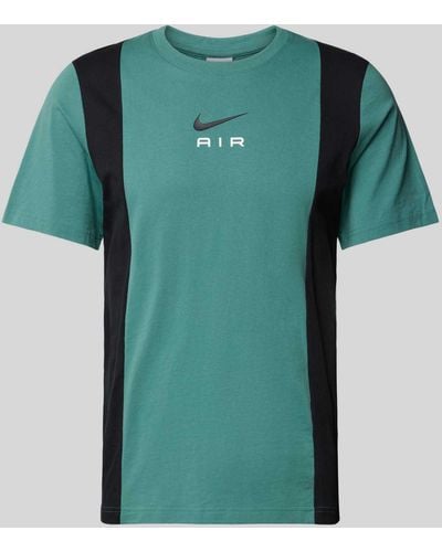 Nike T-Shirt mit Label-Print - Grün