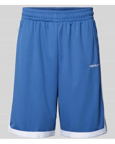 PEGADOR Loose Fit Basketballshorts mit Label-Stitching - Blau
