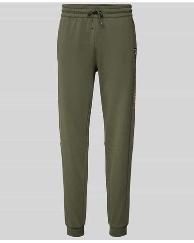 EA7 Regular Fit Sweatpants mit Label-Print Modell 'PANTALONI' - Grün