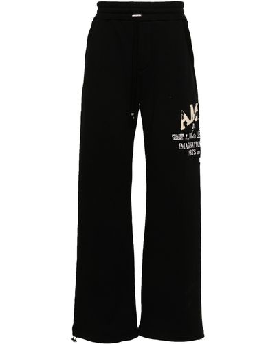 Amiri Logo-embroidered Wide-leg Track Pants - Black