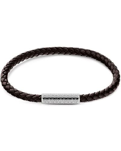 Calvin Klein Gents Black Leather And Stainless Steel Single Wrap Bracelet.