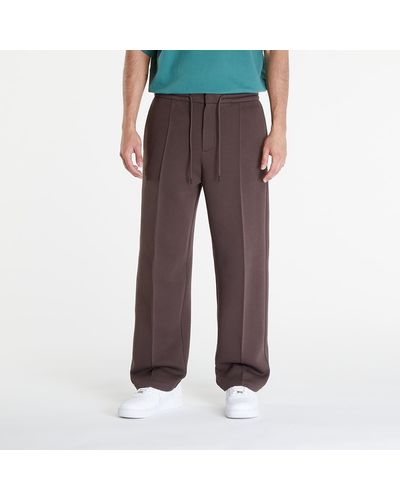 Nike Sportswear tech fleece reimagined loose fit open hem sweatpants - Marrone