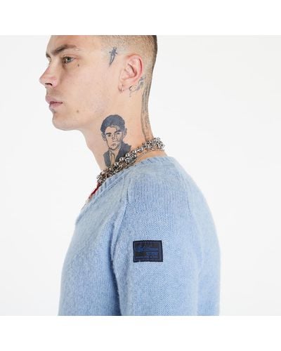 Raf Simons Striped hammersleeve v-neck sweater - Blau