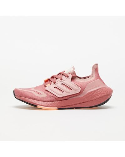 pink and red sneakers