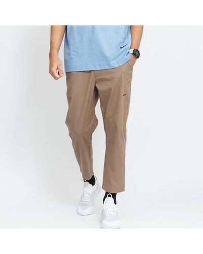 Nike Sportswear style woven unlined sneaker pants light brown - Blau