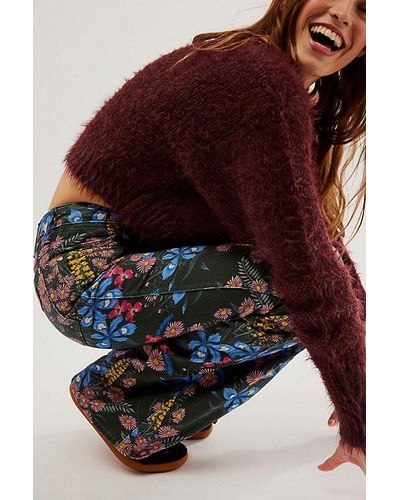 Wrangler Wanderer 622 Printed High-rise Jeans At Free People In Collage Florals, Size: 26 - Red