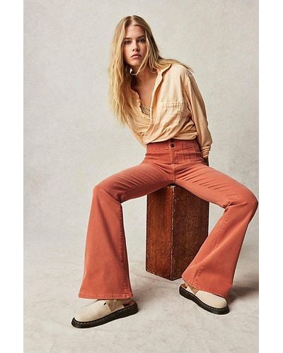 Free People Jayde Flare Jeans At Free People In Apricot Brandy, Size: 25 - Orange
