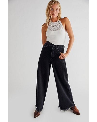 Free People Old West Slouchy Jeans At Free People In Panther, Size: 28 - Blue
