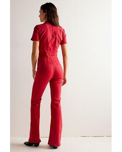 Free People Jayde Flare Jumpsuit At Free People In Formula One, Size: Large - Red