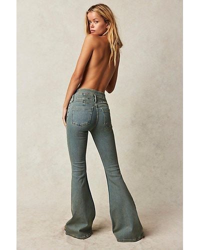 Free People After Dark Mid-rise Flare Jeans At Free People In Vintage, Size: 32 - Multicolor