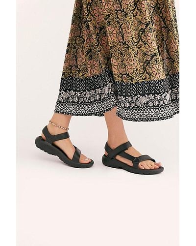 Teva Hurricane Drift Sandals At Free People In Black, Size: Us 8 - Natural