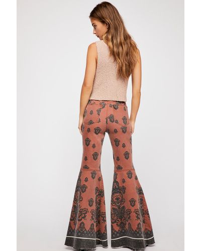 Free People Just Float On Printed Flare Jeans By We The Free - Orange