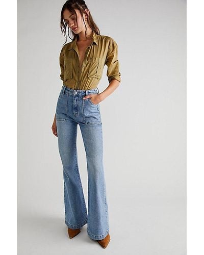 Rolla's East Coast Flare Jeans At Free People In Organic Mid Blue, Size: 31