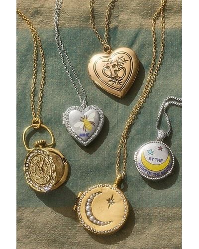 Ariana Ost Moon Locket At Free People In Gold - Green