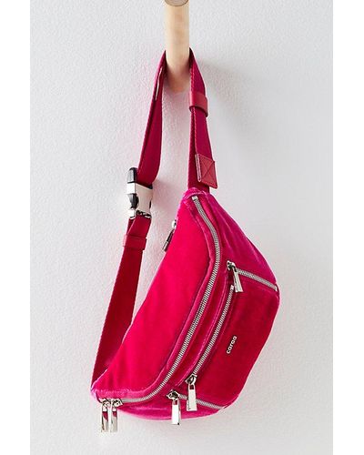 CARAA Velvet Small Sling Bag At Free People In Hot Pink - Red