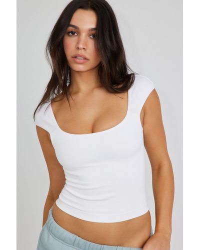 White Sleeveless and tank tops for Women | Lyst