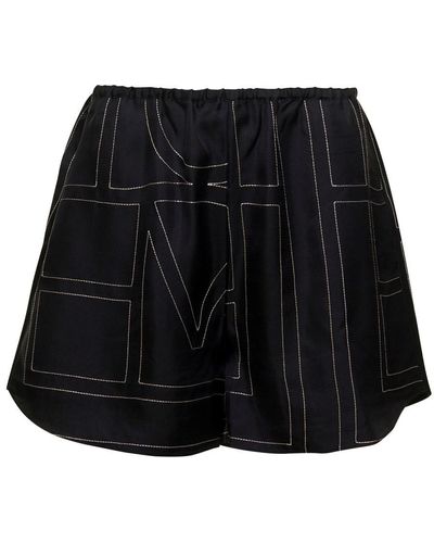Totême Pantaloncini Shorts Con Stampa Logo All-Over Neri - Nero