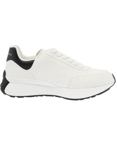 Alexander McQueen Sneakers basse bianche con linguetta logo - Bianco