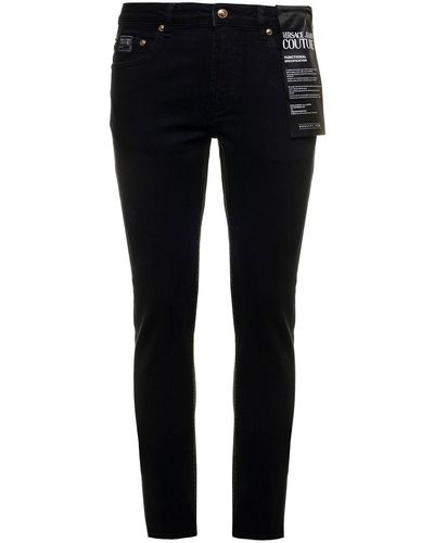 Versace Dark E Jeans In Stretch Denim With Ebossed Logo Man - Multicolour