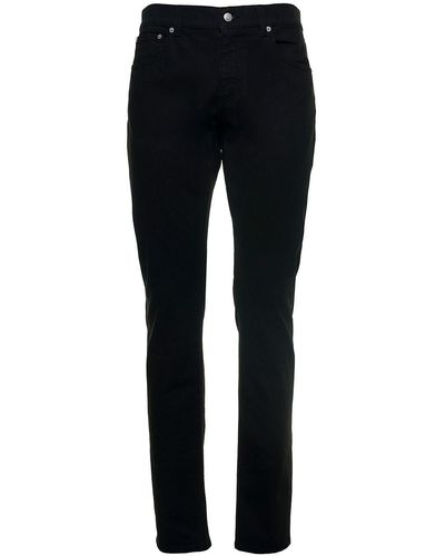 Alexander McQueen Jeans neri in denim con logo - Multicolore