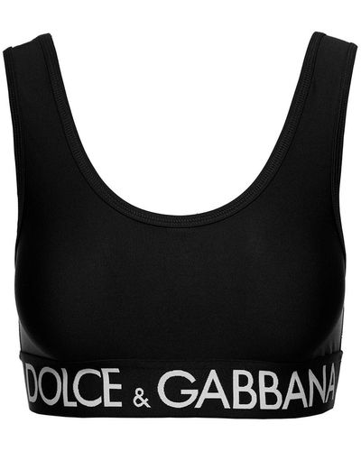 Dolce & Gabbana Top sportivo con banda logata in tessuto tecnico stretch donna - Nero