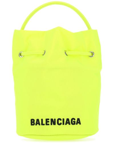Yellow Balenciaga Bucket bags and bucket purses for Women | Lyst