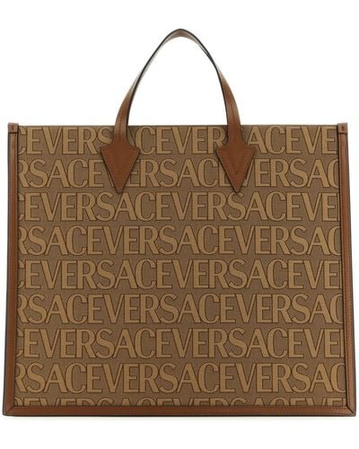 Versace Canvas And Leather Shopping Bag - Brown