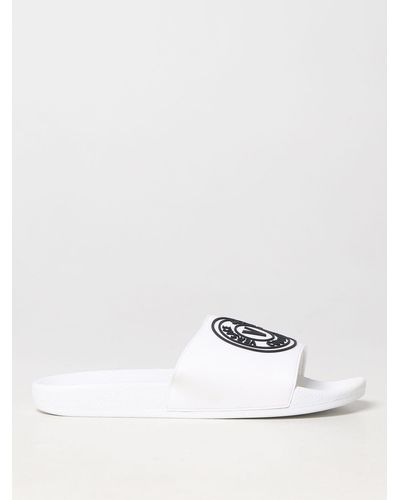 Versace Jeans Couture Sandales à enfiler blanches à logo circulaire
