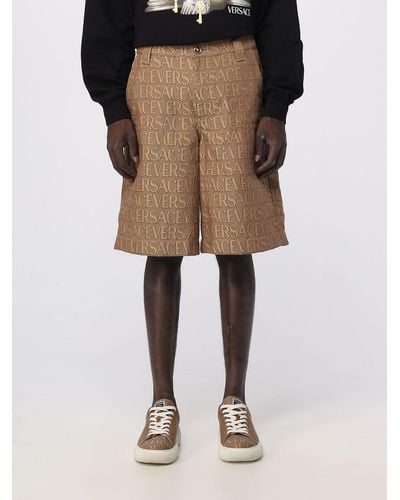 Versace Pantaloncino in misto cotone con logo all over - Neutro