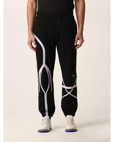 McQ Striae Cotton jogging Pants With Graphic Prints - Black