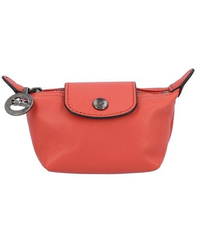 longchamp cosmetic bag with a strap｜TikTok Search