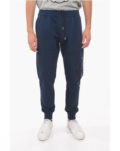 Alexander McQueen Brushed-Cotton Joggers With Logo Print - Blue