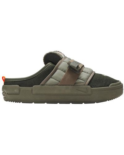 green slip on sneakers