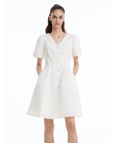 GOELIA Fitted Waist And V-Neck Jacquard Midi Dress - White