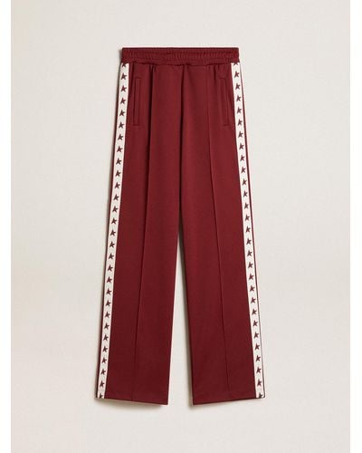 Golden Goose ’S Burgundy Sweatpants With Stars On The Sides - Red