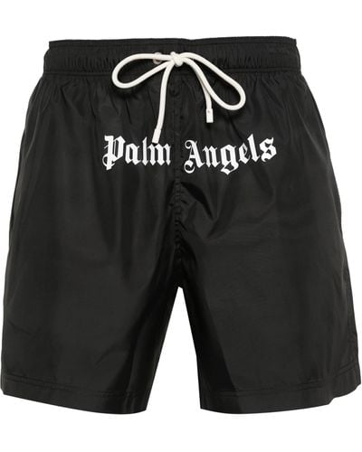Palm Angels , pantaloncini da bagno con stampa del logo - Nero