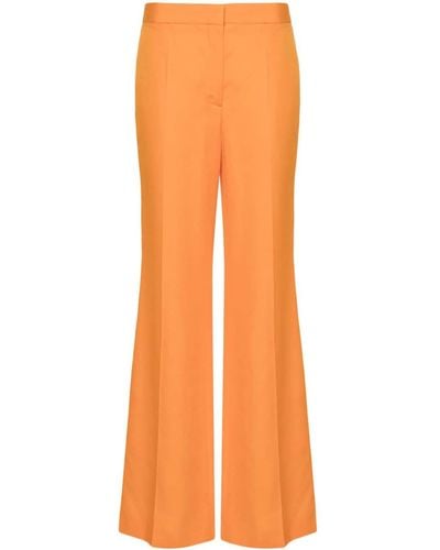 Stella McCartney Pantaloni svasati a vita media - Arancione