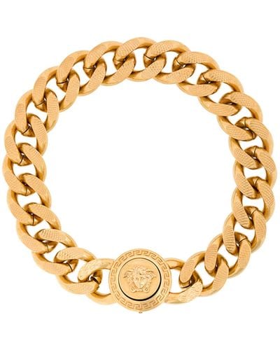 Versace Bracciale a catena in metallo dorato con logo - Metallizzato