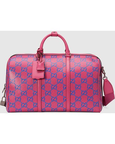 Gucci GG Embossed Duffle Bag - Pink