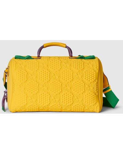 Gucci Medium GG Scuba Duffle Bag - Yellow