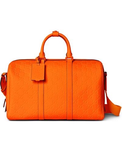Gucci GG Rubber-effect Medium Duffle Bag - Orange