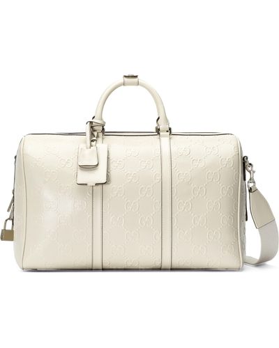 Gucci GG Embossed Duffle Bag - White