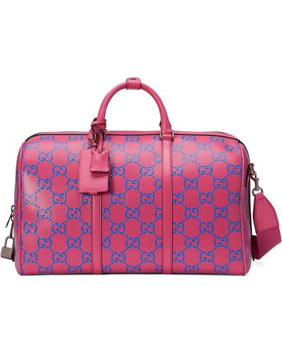 Gucci GG Embossed Duffle Bag - Pink